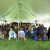 Concertgoers sit under a tent at the W.K. Kellogg Biological Station grounds during a past Lakeside Concert event.